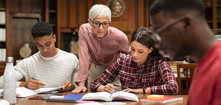 Instructor explaining cross registration to college students