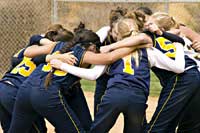 Softball team huddle