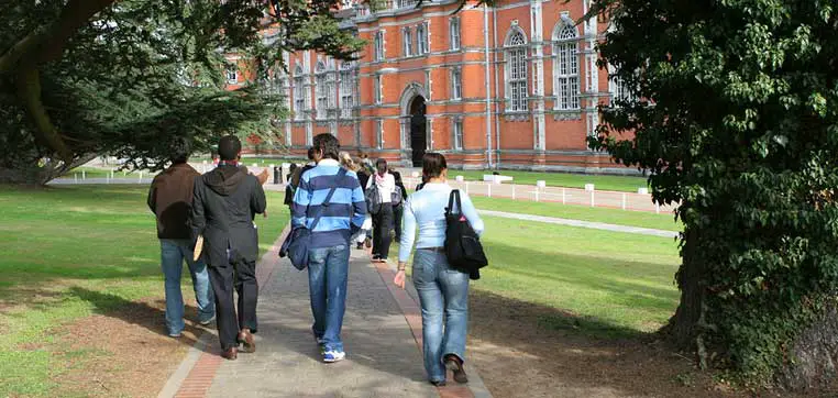 students walking on campus representing college visits