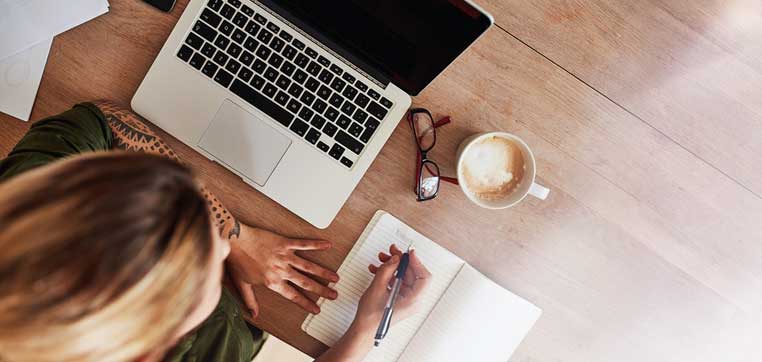 woman with computer and planner representing Legal documents for college students